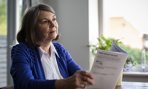 Woman reading through the options of leaving gifts in her will